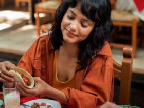 A girl is enjoying a meal at a restaurant